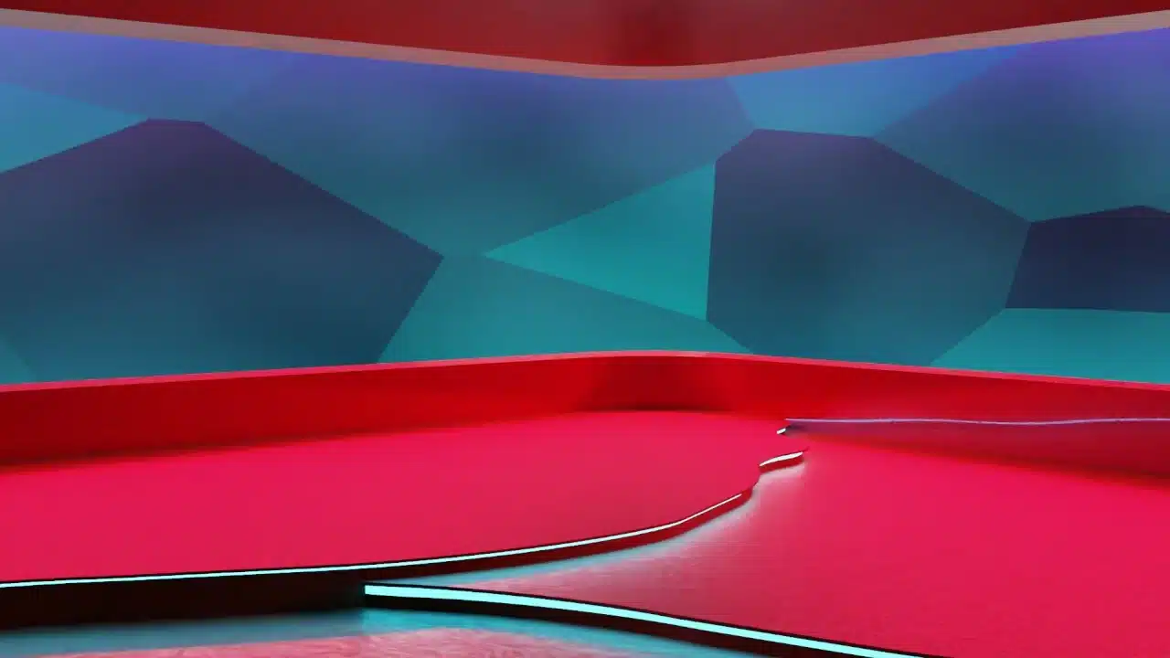 Ein TV-Studio-Hintergrund mit roten Boden und einer blauen Wand mit Mustern im Hintergrund